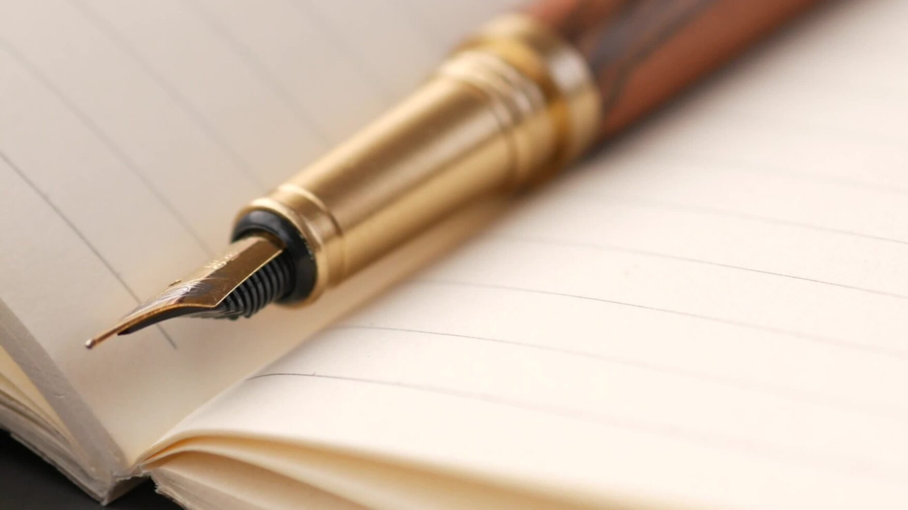 ink-pen-on-lined-notebook-video